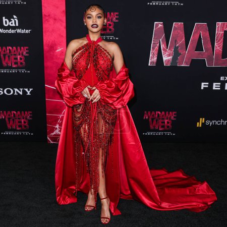 Photo for Celeste O'Connor wearing a Gert-Johan Coetzee dress and Jimmy Choo shoes arrives at the World Premiere Of Columbia Pictures' 'Madame Web' held at the Regency Village Theatre on February 12, 2024 in Westwood, Los Angeles, California, United States. - Royalty Free Image