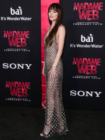 Photo for Dakota Johnson wearing Gucci arrives at the World Premiere Of Columbia Pictures' 'Madame Web' held at the Regency Village Theatre on February 12, 2024 in Westwood, Los Angeles, California, United States. - Royalty Free Image