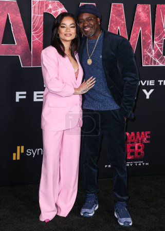 Photo for Dannella Lane and boyfriend Lil Rel Howery arrive at the World Premiere Of Columbia Pictures' 'Madame Web' held at the Regency Village Theatre on February 12, 2024 in Westwood, Los Angeles, California, United States. - Royalty Free Image