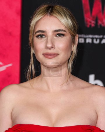 Photo for Emma Roberts wearing a Carolina Herrera dress arrives at the World Premiere Of Columbia Pictures' 'Madame Web' held at the Regency Village Theatre on February 12, 2024 in Westwood, Los Angeles, California, United States. - Royalty Free Image