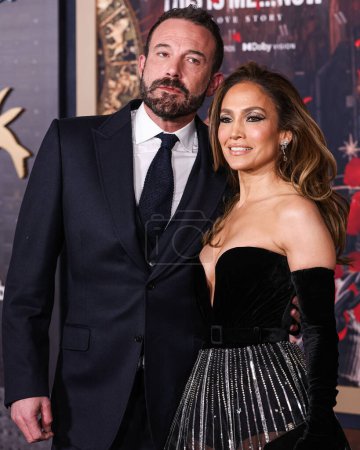 Photo for Ben Affleck and wife Jennifer Lopez (JLo) wearing a Zuhair Murad Couture gown with Joseph Saidian and Sons vintage Van Cleef & Arpels diamond earrings and A.Jaffe diamond rings arrive at the Los Angeles Premiere Of Amazon MGM Studios' 'This Is Me - Royalty Free Image