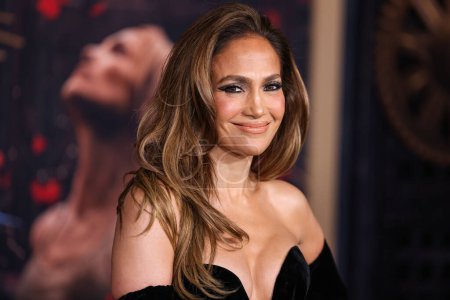 Photo for Jennifer Lopez (JLo) wearing a Zuhair Murad Couture gown with Joseph Saidian and Sons vintage Van Cleef and Arpels diamond earrings and A.Jaffe diamond rings arrives at the Los Angeles Premiere Of Amazon MGM Studios' 'This Is Me...Now: A Love Story' - Royalty Free Image