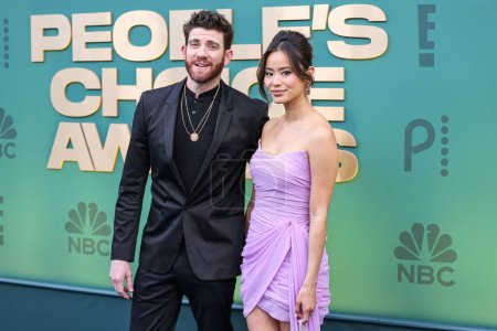 Photo for Bryan Greenberg and wife Jamie Chung arrive at the 49th Annual People's Choice Awards 2024 held at The Barker Hangar on February 18, 2024 in Santa Monica, Los Angeles, California, United States. - Royalty Free Image