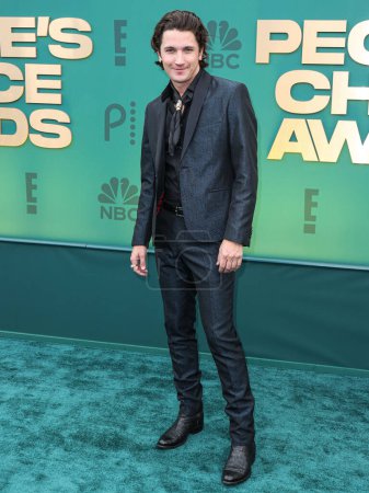 Photo for Drake Milligan arrives at the 49th Annual People's Choice Awards 2024 held at The Barker Hangar on February 18, 2024 in Santa Monica, Los Angeles, California, United States. - Royalty Free Image