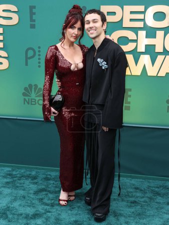 Photo for Emily Cannon Schneider and husband Max Schneider arrive at the 49th Annual People's Choice Awards 2024 held at The Barker Hangar on February 18, 2024 in Santa Monica, Los Angeles, California, United States. - Royalty Free Image