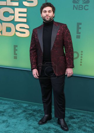 Photo for Jake Borelli arrives at the 49th Annual People's Choice Awards 2024 held at The Barker Hangar on February 18, 2024 in Santa Monica, Los Angeles, California, United States. - Royalty Free Image
