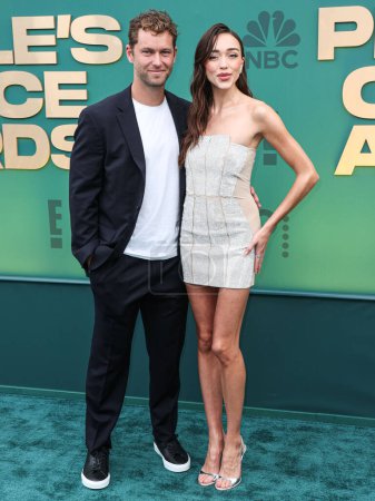 Photo for Michael Stevens and girlfriend Sophia Culpo arrive at the 49th Annual People's Choice Awards 2024 held at The Barker Hangar on February 18, 2024 in Santa Monica, Los Angeles, California, United States. - Royalty Free Image