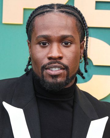 Photo for Shameik Moore arrives at the 49th Annual People's Choice Awards 2024 held at The Barker Hangar on February 18, 2024 in Santa Monica, Los Angeles, California, United States. - Royalty Free Image