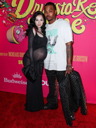 Photo for Bhad Bhabie (Danielle Peskowitz Bregoli) and boyfriend Le Vaughn arrive at the Los Angeles Premiere Of Shout! Studios, All Things Comedy and Utopia's 'Drugstore June' held at the TCL Chinese 6 Theaters on February 20, 2024 in Hollywood, Los Angeles - Royalty Free Image