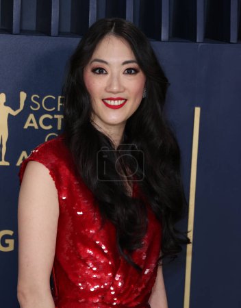Photo for Clara Wong wearing an Iris Van Herpen Couture dress and Brandon Blackwood shoes arrives at the 30th Annual Screen Actors Guild Awards held at the Shrine Auditorium and Expo Hall on February 24, 2024 in Los Angeles, California, United States. - Royalty Free Image