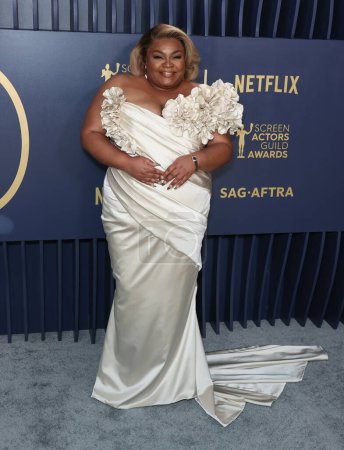 Photo for Da'Vine Joy Randolph wearing a Valdrin Sahiti dress, Steve Madden shoes, an Omega watch, and Irene Neuwirth jewels arrives at the 30th Annual Screen Actors Guild Awards held at the Shrine Auditorium and Expo Hall on February 24, 2024 in Los Angeles - Royalty Free Image