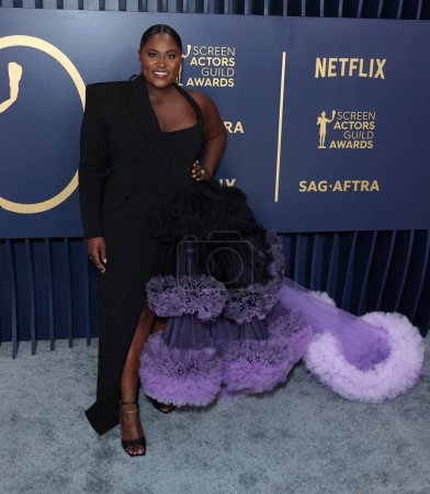 Photo for Danielle Brooks wearing Christian Siriano arrives at the 30th Annual Screen Actors Guild Awards held at the Shrine Auditorium and Expo Hall on February 24, 2024 in Los Angeles, California, United States. - Royalty Free Image