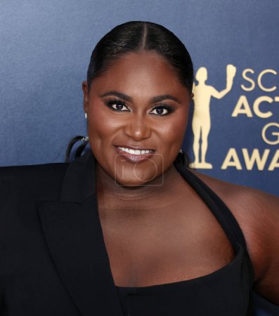 Photo for Danielle Brooks wearing Christian Siriano arrives at the 30th Annual Screen Actors Guild Awards held at the Shrine Auditorium and Expo Hall on February 24, 2024 in Los Angeles, California, United States. - Royalty Free Image