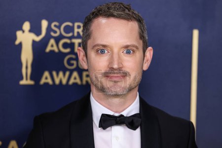 Photo for Elijah Wood arrives at the 30th Annual Screen Actors Guild Awards held at the Shrine Auditorium and Expo Hall on February 24, 2024 in Los Angeles, California, United States. - Royalty Free Image