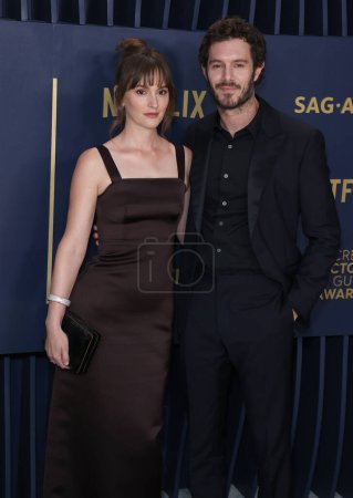Photo for Leighton Meester and husband Adam Brody arrive at the 30th Annual Screen Actors Guild Awards held at the Shrine Auditorium and Expo Hall on February 24, 2024 in Los Angeles, California, United States. - Royalty Free Image