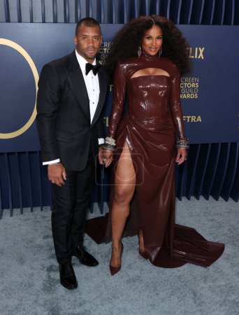 Photo for Russell Wilson and wife Ciara arrive at the 30th Annual Screen Actors Guild Awards held at the Shrine Auditorium and Expo Hall on February 24, 2024 in Los Angeles, California, United States. - Royalty Free Image