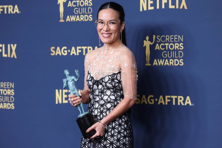 Photo for Ali Wong, winner of  Female Actor in a Television Movie or Limited Series award for 'Beef' poses in the press room at the 30th Annual Screen Actors Guild Awards held at the Shrine Auditorium and Expo Hall on February 24,2024 - Royalty Free Image