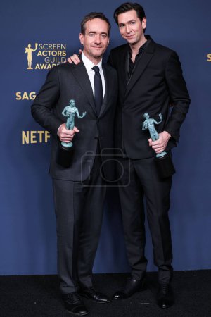 Photo for Matthew Macfadyen and Nicholas Braun, winners of the Outstanding Performance by an Ensemble in a Drama Series award for 'Succession' pose in the press room at the 30th Annual Screen Actors Guild Awards on February 24, 2024 in LA, USA. - Royalty Free Image