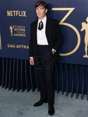 Photo for Cillian Murphy wearing Saint Laurent arrives at the 30th Annual Screen Actors Guild Awards held at the Shrine Auditorium and Expo Hall on February 24, 2024 in Los Angeles, California, United States. - Royalty Free Image