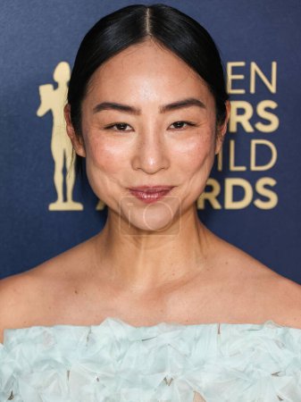 Photo for Greta Lee wearing The Row arrives at the 30th Annual Screen Actors Guild Awards held at the Shrine Auditorium and Expo Hall on February 24, 2024 in Los Angeles, California, United States. - Royalty Free Image