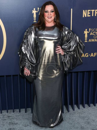 Photo for Melissa McCarthy wearing a Puey Quinones dress and Dena Kemp jewels arrives at the 30th Annual Screen Actors Guild Awards held at the Shrine Auditorium and Expo Hall on February 24, 2024 in Los Angeles, California, United States. - Royalty Free Image