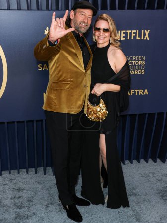Photo for Troy Kotsur and Deanne Bray arrive at the 30th Annual Screen Actors Guild Awards held at the Shrine Auditorium and Expo Hall on February 24, 2024 in Los Angeles, California, United States. - Royalty Free Image