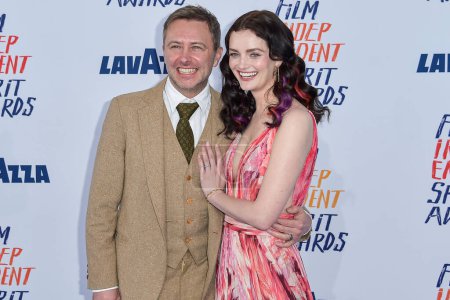 Photo for Chris Hardwick and wife Lydia Hearst arrive at the 2024 Film Independent Spirit Awards (39th Annual Film Independent Spirit Awards) held at the Santa Monica Beach on February 25, 2024 in Santa Monica, Los Angeles, California, United States. - Royalty Free Image