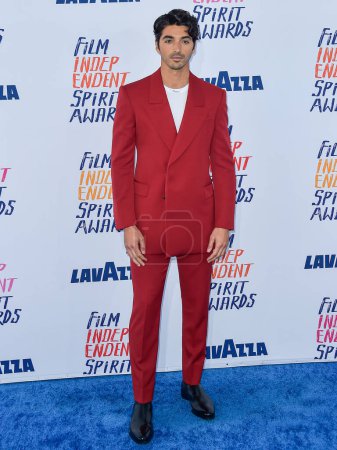 Photo for Taylor Zakhar Perez wearing Alexander McQueen arrives at the 2024 Film Independent Spirit Awards (39th Annual Film Independent Spirit Awards) held at the Santa Monica Beach on February 25, 2024 in Santa Monica, Los Angeles, California, United States. - Royalty Free Image