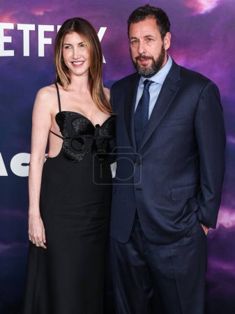 Photo for Jackie Sandler and husband Adam Sandler arrive at the Los Angeles Special Screening Of Netflix's 'Spaceman' held at The Egyptian Theatre Hollywood on February 26, 2024 in Hollywood, Los Angeles, California, United States. - Royalty Free Image