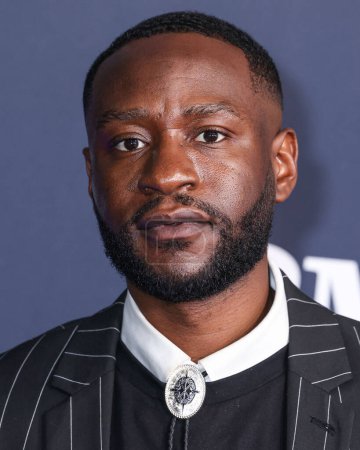 Photo for Michael Oloyede arrives at the Los Angeles Premiere Of STARZ' 'BMF' (Black Mafia Family) Season 3 held at the Hollywood Athletic Club on February 29, 2024 in Hollywood, Los Angeles, California, United States. - Royalty Free Image