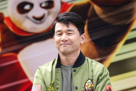 Photo for Ronny Chieng arrives at the World Premiere Of DreamWorks Animation And Universal Pictures' 'Kung Fu Panda 4' held at AMC The Grove 14 on March 3, 2024 in Los Angeles, California, United States. - Royalty Free Image