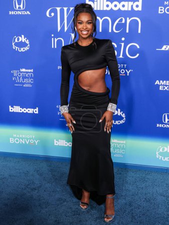 Photo for Coco Jones wearing Annakiki SS24 RTW arrives at the 2024 Billboard Women In Music held at the YouTube Theater at SoFi Stadium on March 6, 2024 in Inglewood, Los Angeles, California, United States. - Royalty Free Image