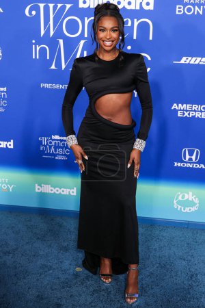 Photo for Coco Jones wearing Annakiki SS24 RTW arrives at the 2024 Billboard Women In Music held at the YouTube Theater at SoFi Stadium on March 6, 2024 in Inglewood, Los Angeles, California, United States. - Royalty Free Image