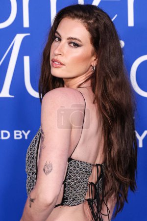 Photo for Fletcher arrives at the 2024 Billboard Women In Music held at the YouTube Theater at SoFi Stadium on March 6, 2024 in Inglewood, Los Angeles, California, United States - Royalty Free Image