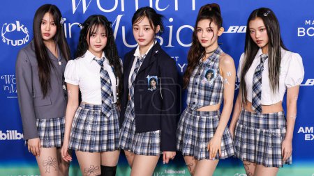 Photo for Hyein, Hanni Pham, Minji, Danielle Marsh and Haerin of South Korean girl group NewJeans arrive at the 2024 Billboard Women In Music held at the YouTube Theater at SoFi Stadium on March 6, 2024 in Inglewood, Los Angeles, California, United States. - Royalty Free Image