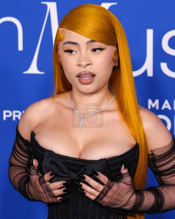 Photo for Ice Spice arrives at the 2024 Billboard Women In Music held at the YouTube Theater at SoFi Stadium on March 6, 2024 in Inglewood, Los Angeles, California, United States. - Royalty Free Image