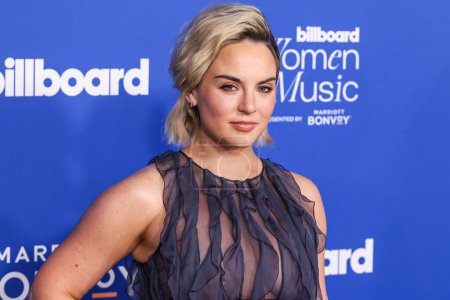 Photo for JoJo arrives at the 2024 Billboard Women In Music held at the YouTube Theater at SoFi Stadium on March 6, 2024 in Inglewood, Los Angeles, California, United States. - Royalty Free Image