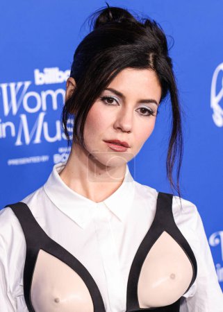 Photo for Marina Diamandis arrives at the 2024 Billboard Women In Music held at the YouTube Theater at SoFi Stadium on March 6, 2024 in Inglewood, Los Angeles, California, United States. - Royalty Free Image