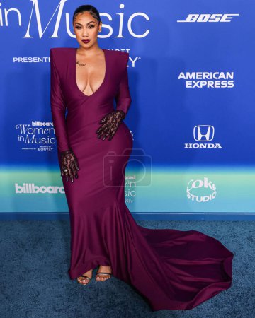 Photo for Queen Naija arrives at the 2024 Billboard Women In Music held at the YouTube Theater at SoFi Stadium on March 6, 2024 in Inglewood, Los Angeles, California, United States. - Royalty Free Image