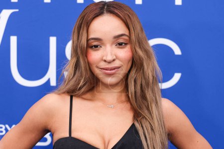 Photo for Tinashe arrives at the 2024 Billboard Women In Music held at the YouTube Theater at SoFi Stadium on March 6, 2024 in Inglewood, Los Angeles, California, United States. - Royalty Free Image