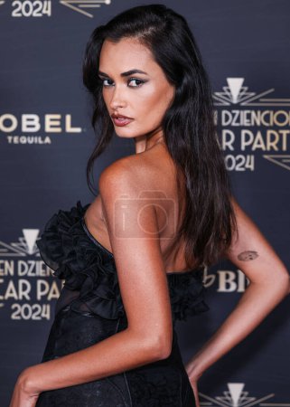 Photo for Gizele Oliveira arrives at Darren Dzienciol's Oscar Party 2024 held at a Private Residence on March 8, 2024 in Bel Air, Los Angeles, California, United States. - Royalty Free Image