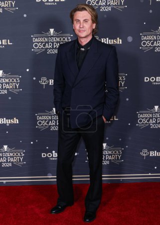 Téléchargez les photos : Jonathan Cheban (Foodgod) arrive à l'Oscar Party 2024 de Darren Dzienciol dans une résidence privée le 8 mars 2024 à Bel Air, Los Angeles, Californie, États-Unis. - en image libre de droit