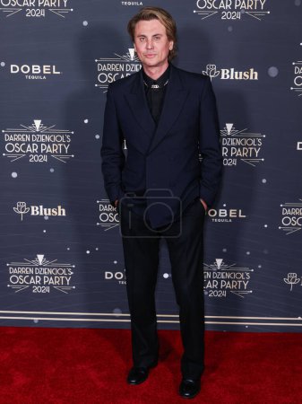 Téléchargez les photos : Jonathan Cheban (Foodgod) arrive à l'Oscar Party 2024 de Darren Dzienciol dans une résidence privée le 8 mars 2024 à Bel Air, Los Angeles, Californie, États-Unis. - en image libre de droit