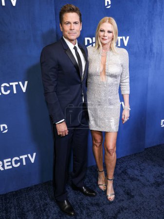 Photo for Rob Lowe and wife Sheryl Berkoff arrive at the DIRECTV Streaming With The Stars Oscar Viewing Party 2024 Hosted By Rob Lowe held at Spago Beverly Hills on March 10, 2024 in Beverly Hills, Los Angeles, California, United States. - Royalty Free Image