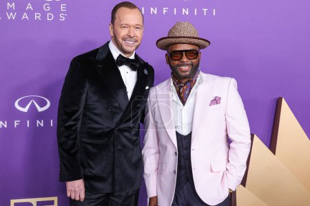 Photo for Donnie Wahlberg and Carl Anthony Payne II arrive at the 55th Annual NAACP Image Awards held at the Shrine Auditorium and Expo Hall on March 16, 2024 in Los Angeles, California, United States. - Royalty Free Image