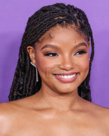 Photo for Halle Bailey wearing Nicole & Felicia Couture arrives at the 55th Annual NAACP Image Awards held at the Shrine Auditorium and Expo Hall on March 16, 2024 in Los Angeles, California, United States. - Royalty Free Image