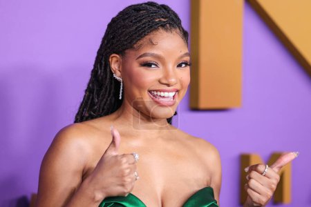 Photo for Halle Bailey wearing Nicole & Felicia Couture arrives at the 55th Annual NAACP Image Awards held at the Shrine Auditorium and Expo Hall on March 16, 2024 in Los Angeles, California, United States. - Royalty Free Image
