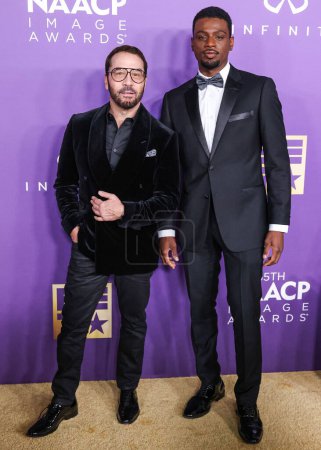 Photo for Jeremy Piven and Everett Osborne arrive at the 55th Annual NAACP Image Awards held at the Shrine Auditorium and Expo Hall on March 16, 2024 in Los Angeles, California, United States. - Royalty Free Image