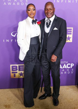 Photo for Keke Palmer and father Larry Palmer arrive at the 55th Annual NAACP Image Awards held at the Shrine Auditorium and Expo Hall on March 16, 2024 in Los Angeles, California, United States. - Royalty Free Image