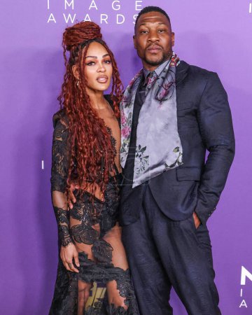 Photo for Meagan Good and boyfriend Jonathan Majors arrive at the 55th Annual NAACP Image Awards held at the Shrine Auditorium and Expo Hall on March 16, 2024 in Los Angeles, California, United States. - Royalty Free Image